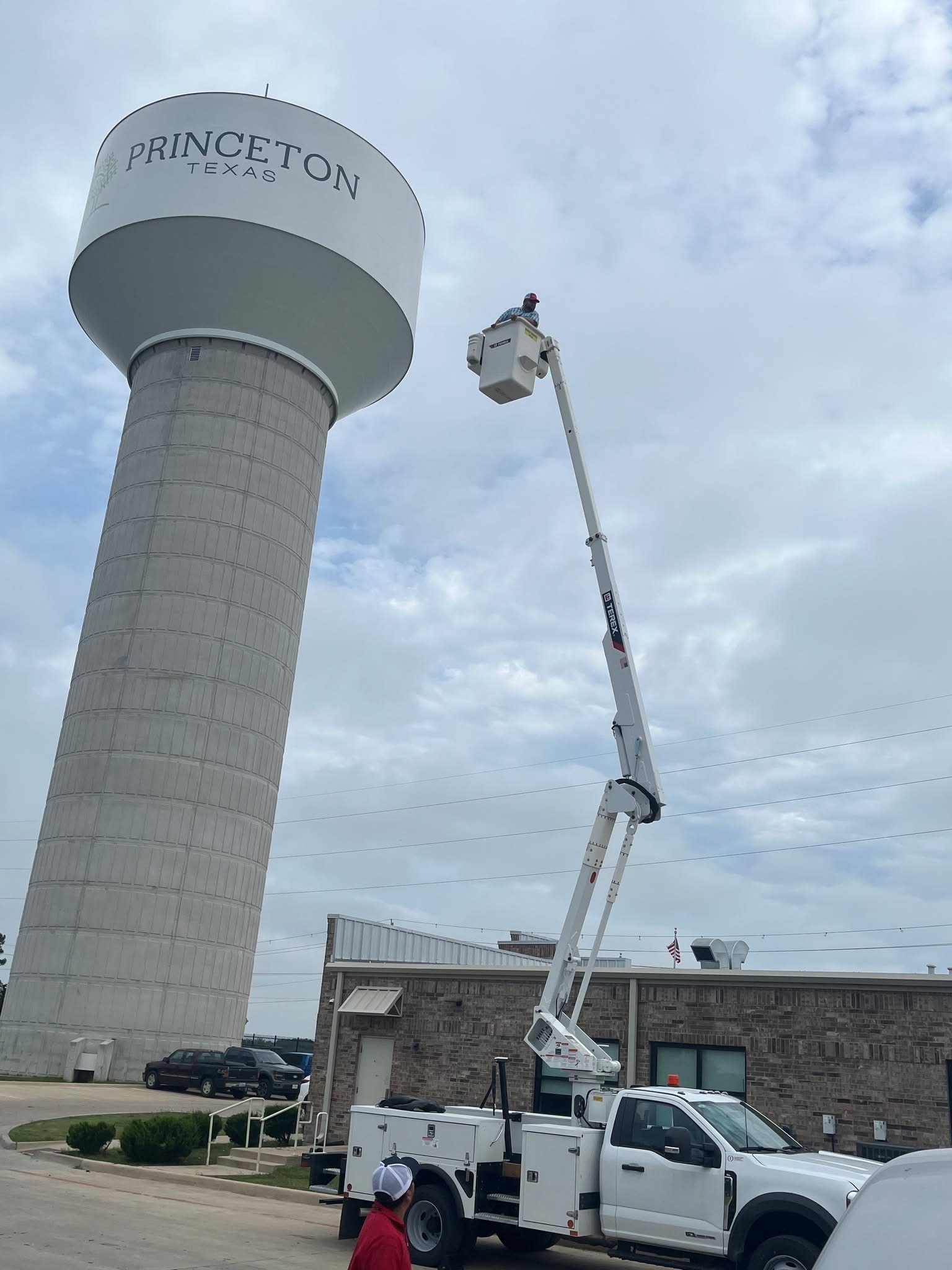 Princeton water tower and worker